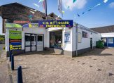 Te Koop: Foto Belegging aan de Julianastraat 28,28A, B in Ewijk
