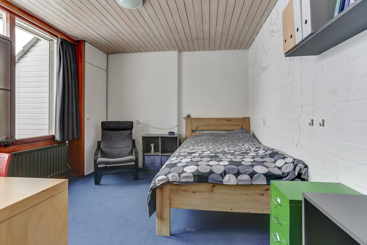 Te koop: Foto Woonhuis aan de Stationsstraat 49 in Rijen