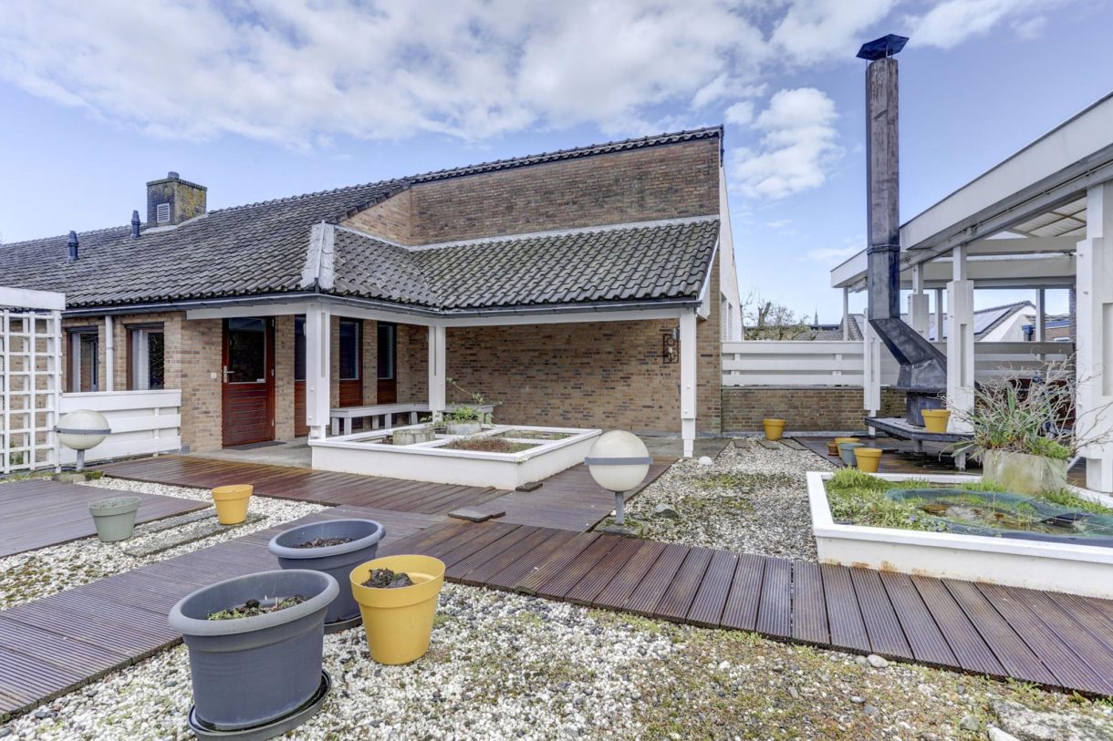 Te koop: Foto Woonhuis aan de Stationsstraat 49 in Rijen