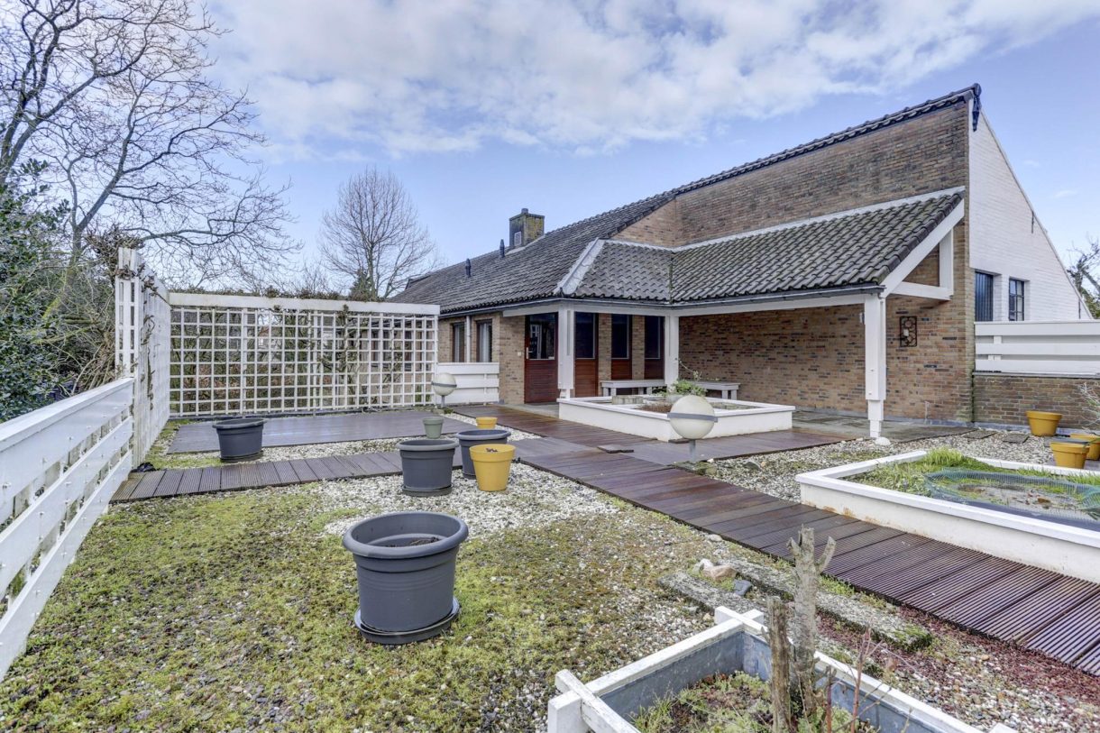 Te koop: Foto Woonhuis aan de Stationsstraat 49 in Rijen