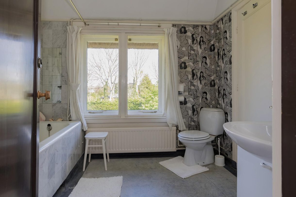 Te koop: Foto Woonhuis aan de 1e Poellaan 59 in Lisse