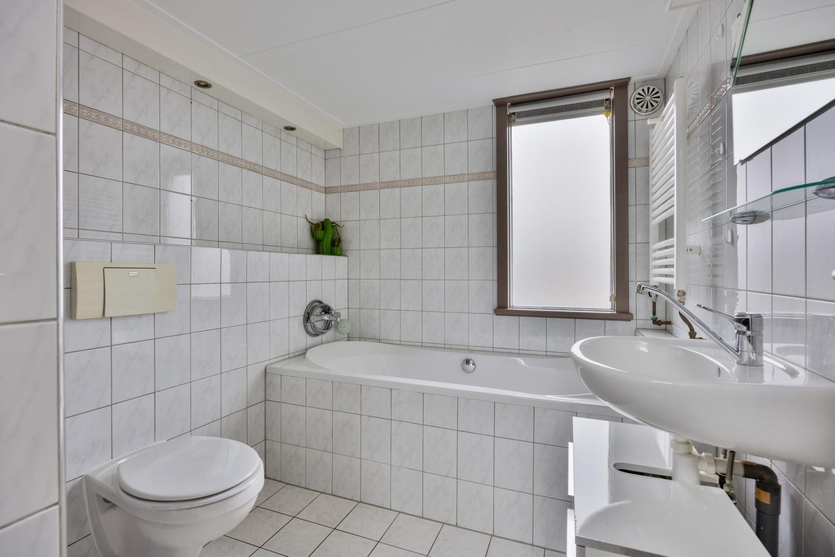 Te koop: Foto Woonhuis aan de Westzanerdijk 98 in Zaandam