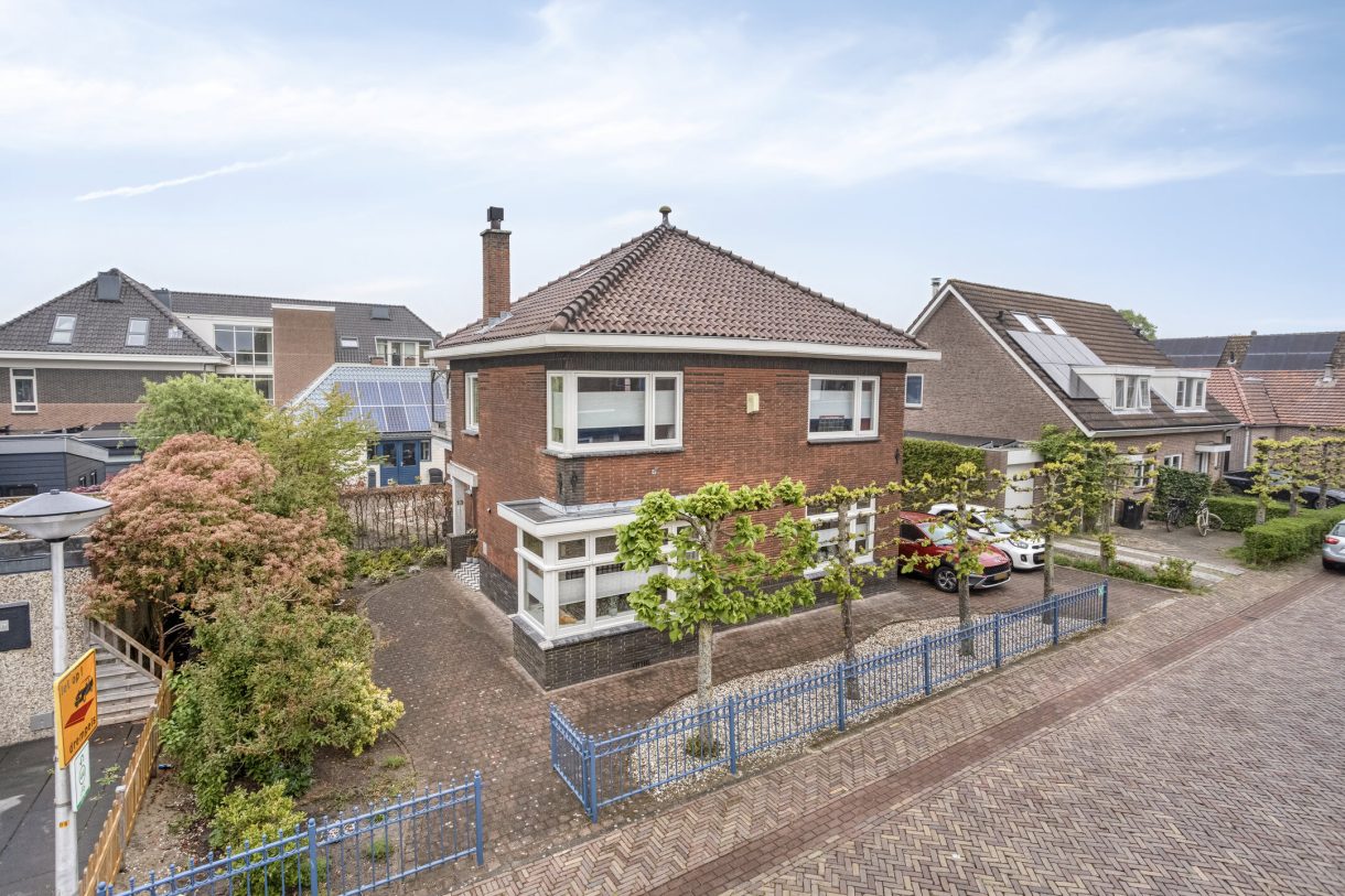 Te koop: Foto Woonhuis aan de Kerkstraat 13 in Woubrugge