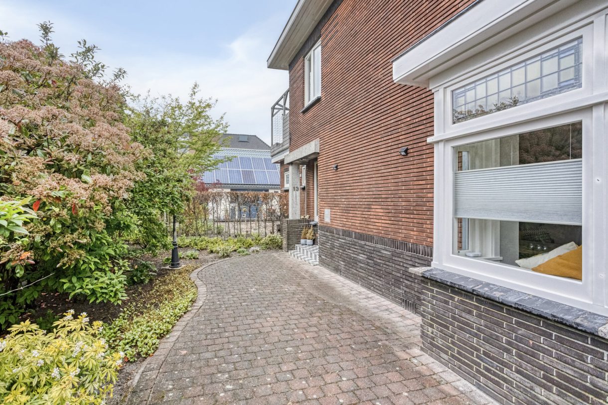 Te koop: Foto Woonhuis aan de Kerkstraat 13 in Woubrugge