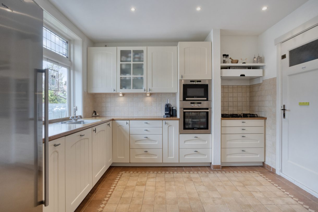 Te koop: Foto Woonhuis aan de Kerkstraat 13 in Woubrugge