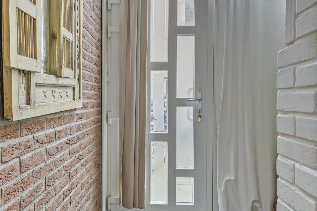 Te koop: Foto Woonhuis aan de Puttershoeksestraat 59 in Schiedam