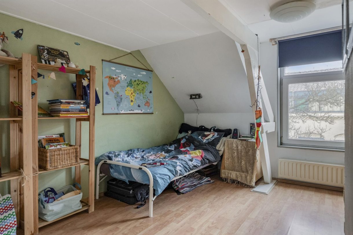 Te koop: Foto Woonhuis aan de Puttershoeksestraat 59 in Schiedam