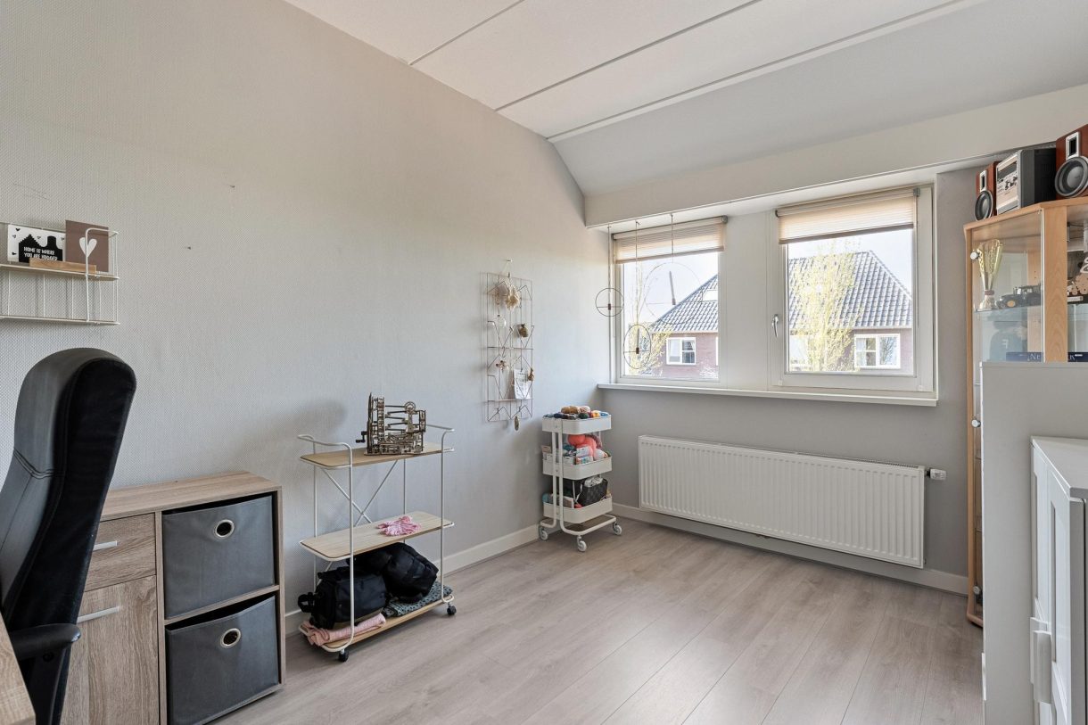 Te koop: Foto Woonhuis aan de Iepenlaan 52 in Rouveen