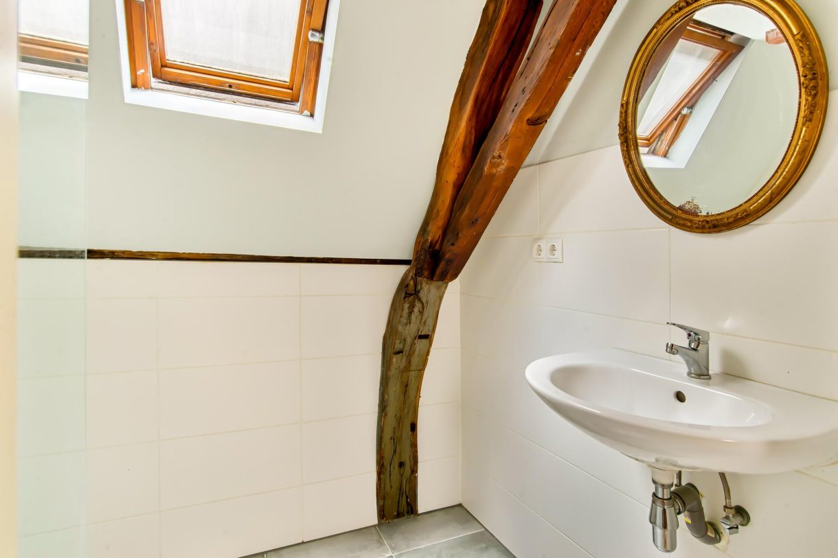 Te koop: Foto Appartement aan de Warmoesstraat 19 in Haarlem