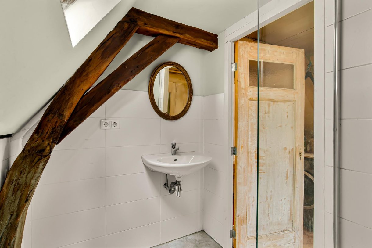 Te koop: Foto Appartement aan de Warmoesstraat 19 in Haarlem