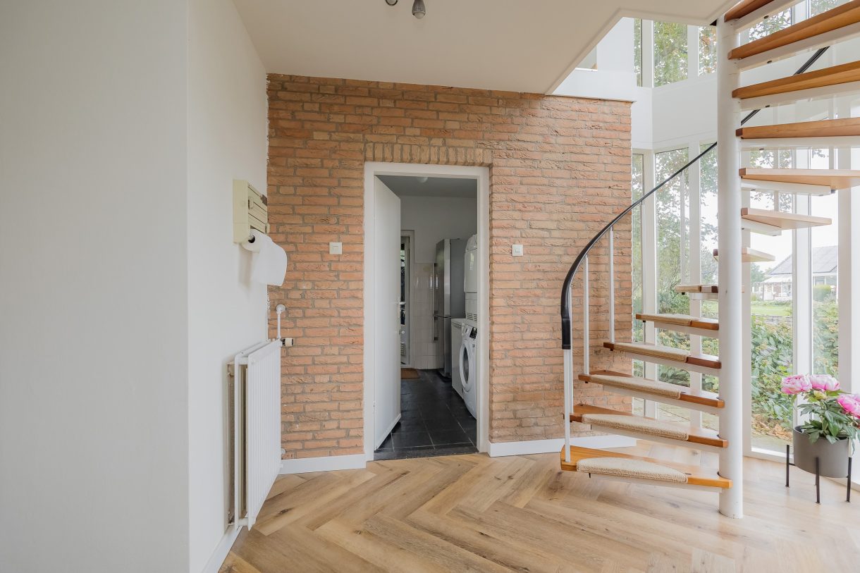 Te koop: Foto Woonhuis aan de Langeweg 86 in Roelofarendsveen