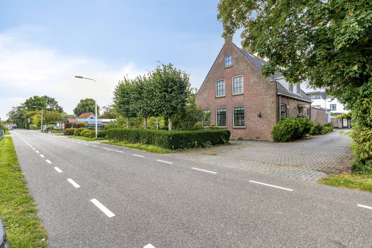 Te koop: Foto Woonhuis aan de Boddens Hosangweg 22 in Woubrugge