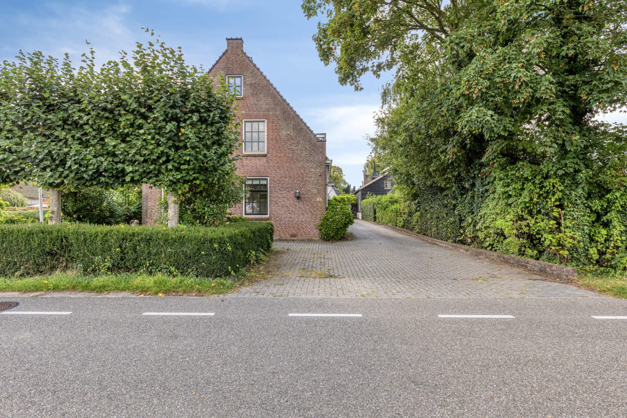 Te koop: Foto Woonhuis aan de Boddens Hosangweg 22 in Woubrugge