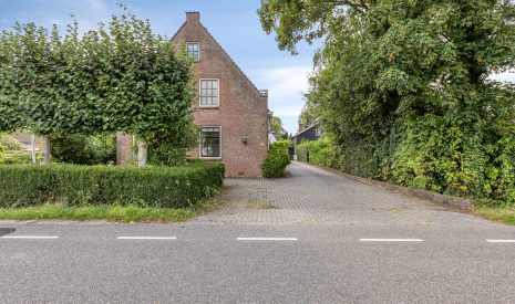 Te koop: Foto Woonhuis aan de Boddens Hosangweg 22 in Woubrugge