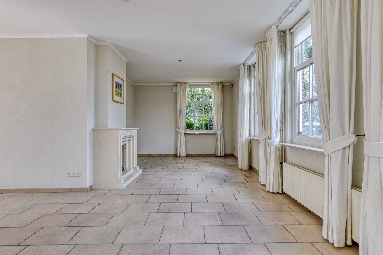 Te koop: Foto Woonhuis aan de Boddens Hosangweg 22 in Woubrugge