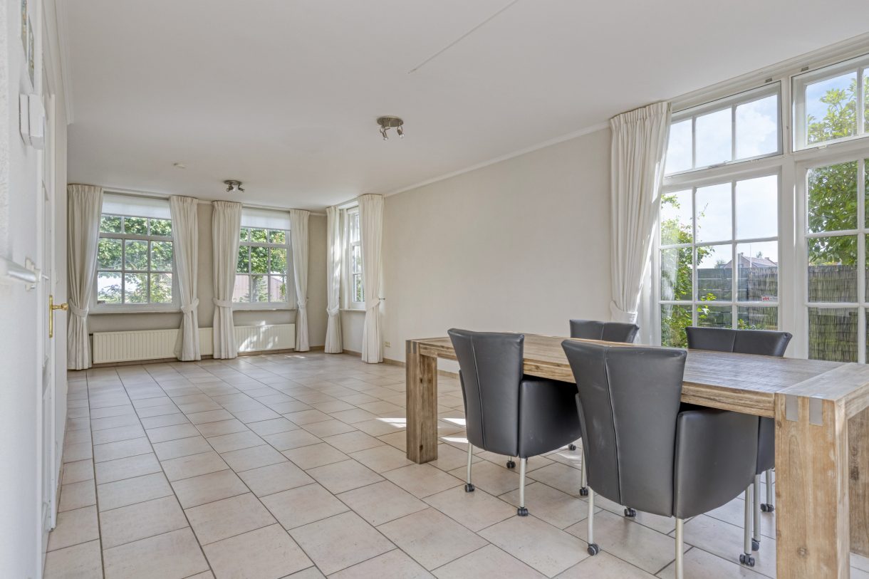 Te koop: Foto Woonhuis aan de Boddens Hosangweg 22 in Woubrugge