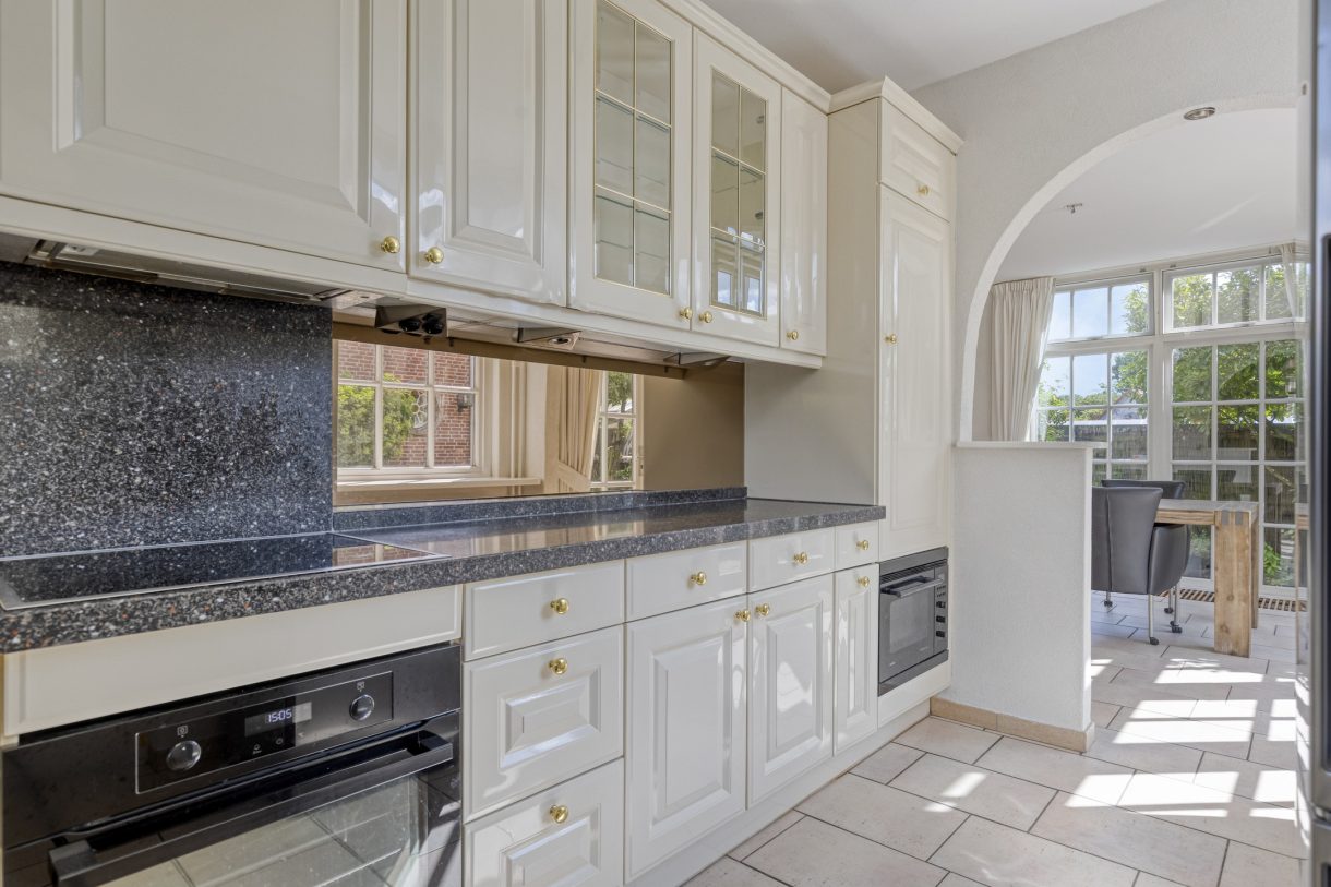 Te koop: Foto Woonhuis aan de Boddens Hosangweg 22 in Woubrugge