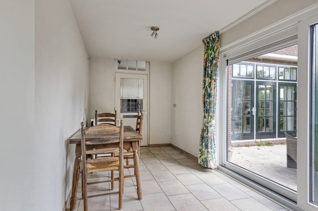 Te koop: Foto Woonhuis aan de Boddens Hosangweg 22 in Woubrugge