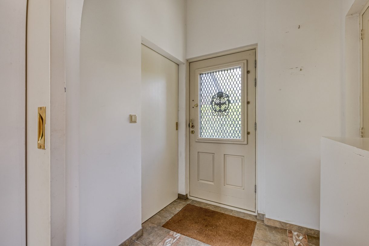 Te koop: Foto Woonhuis aan de Boddens Hosangweg 22 in Woubrugge