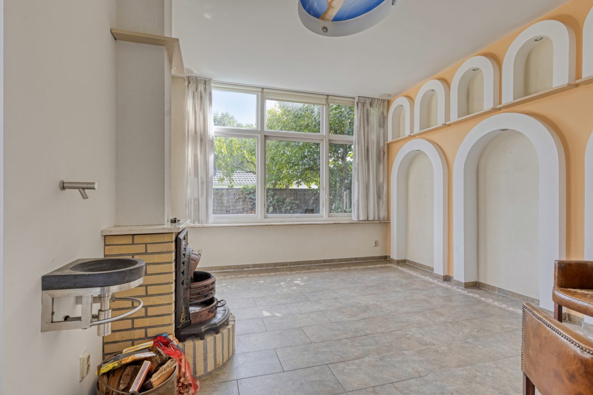 Te koop: Foto Woonhuis aan de Boddens Hosangweg 22 in Woubrugge