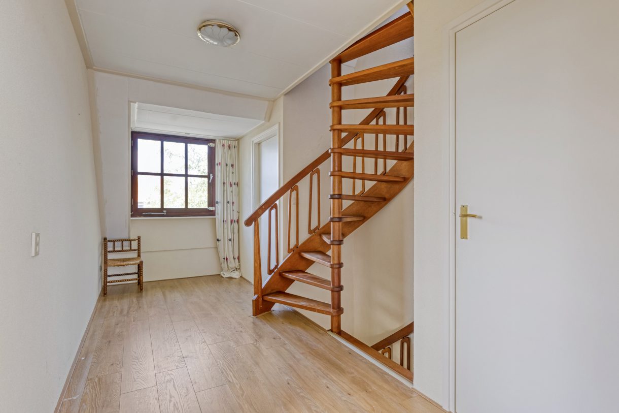 Te koop: Foto Woonhuis aan de Boddens Hosangweg 22 in Woubrugge