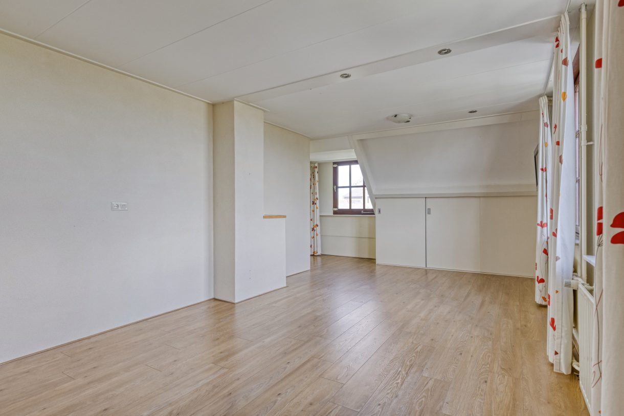 Te koop: Foto Woonhuis aan de Boddens Hosangweg 22 in Woubrugge