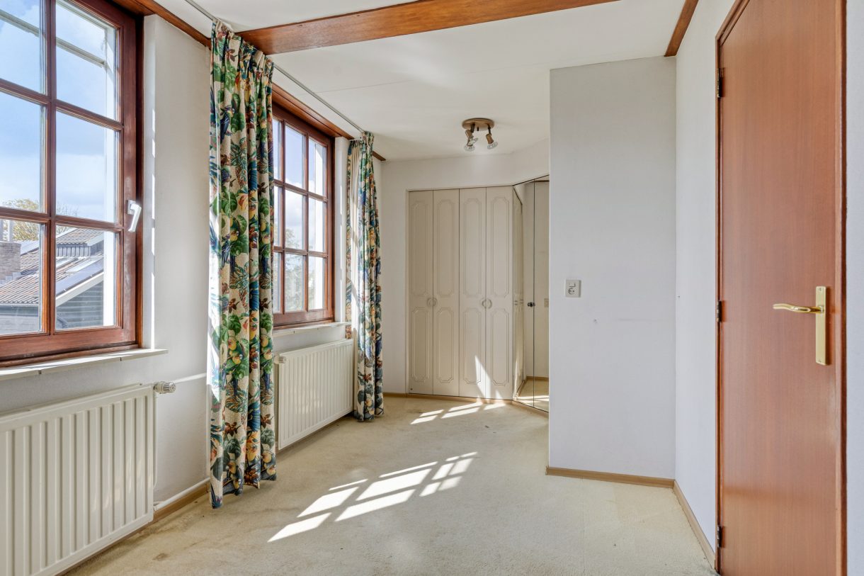 Te koop: Foto Woonhuis aan de Boddens Hosangweg 22 in Woubrugge