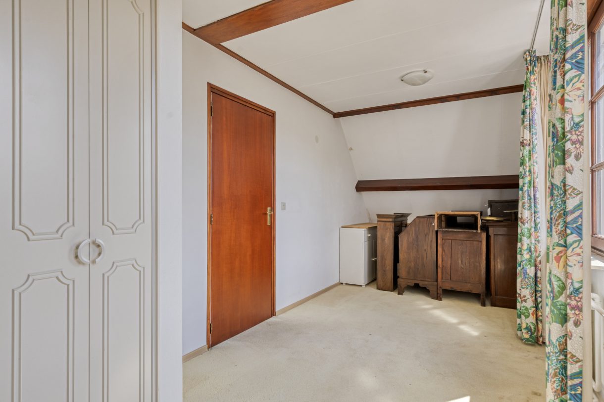 Te koop: Foto Woonhuis aan de Boddens Hosangweg 22 in Woubrugge