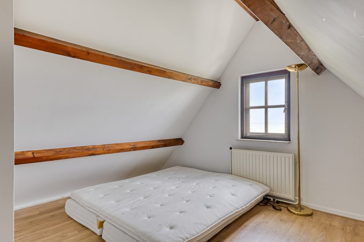 Te koop: Foto Woonhuis aan de Boddens Hosangweg 22 in Woubrugge