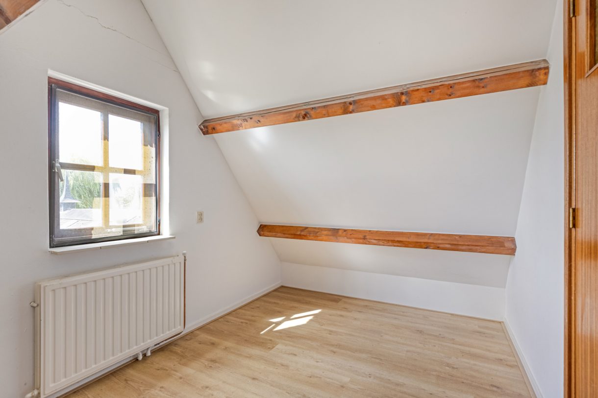 Te koop: Foto Woonhuis aan de Boddens Hosangweg 22 in Woubrugge