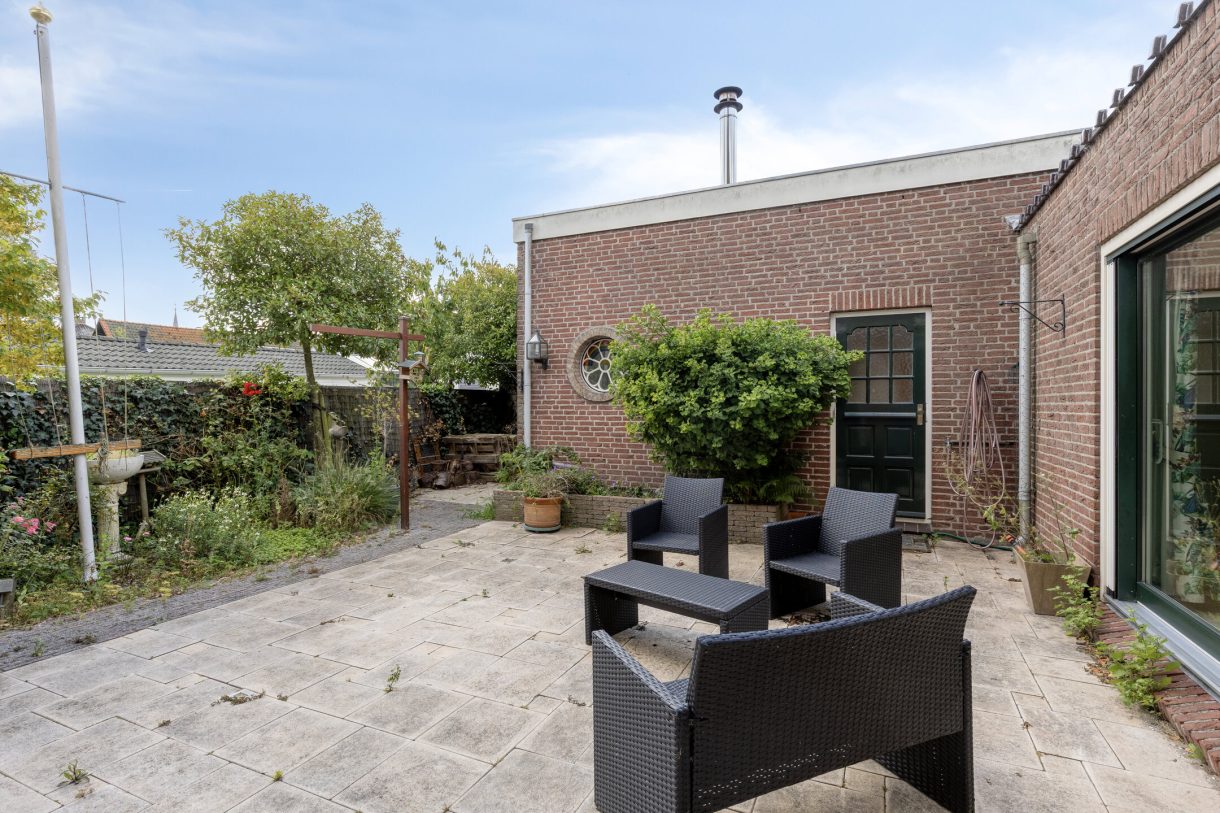 Te koop: Foto Woonhuis aan de Boddens Hosangweg 22 in Woubrugge