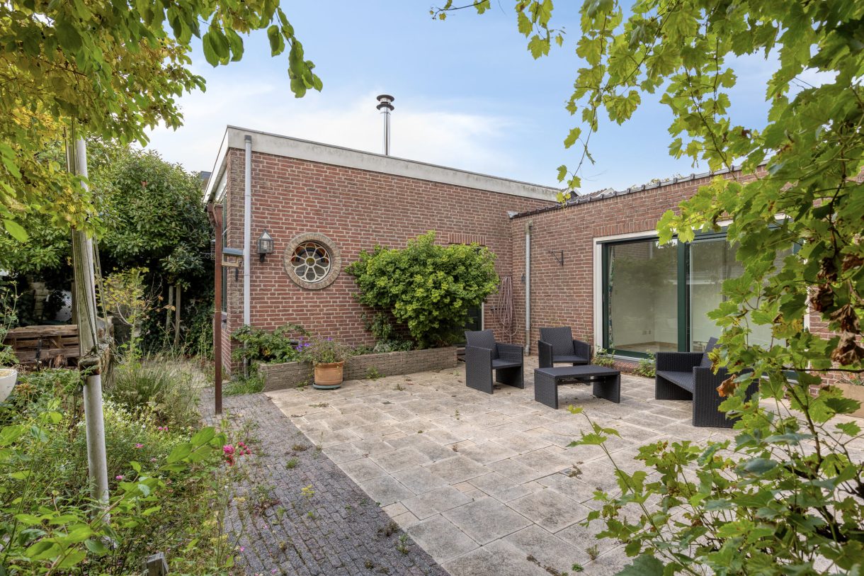 Te koop: Foto Woonhuis aan de Boddens Hosangweg 22 in Woubrugge