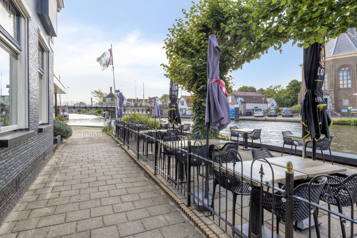 Te koop: Foto Woonhuis aan de Boddens Hosangweg 22 in Woubrugge