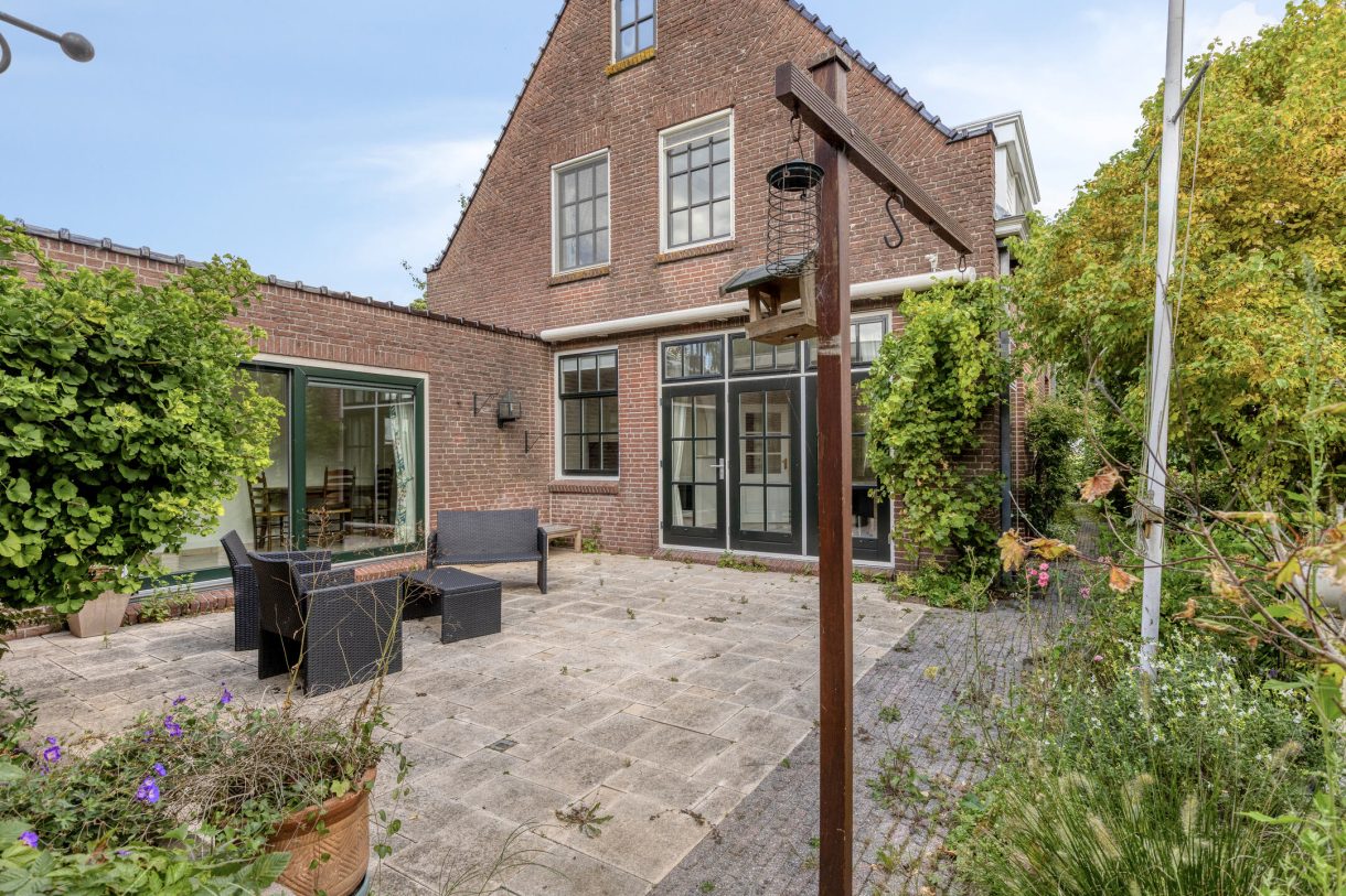 Te koop: Foto Woonhuis aan de Boddens Hosangweg 22 in Woubrugge