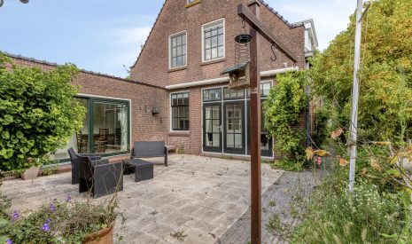 Te koop: Foto Woonhuis aan de Boddens Hosangweg 22 in Woubrugge