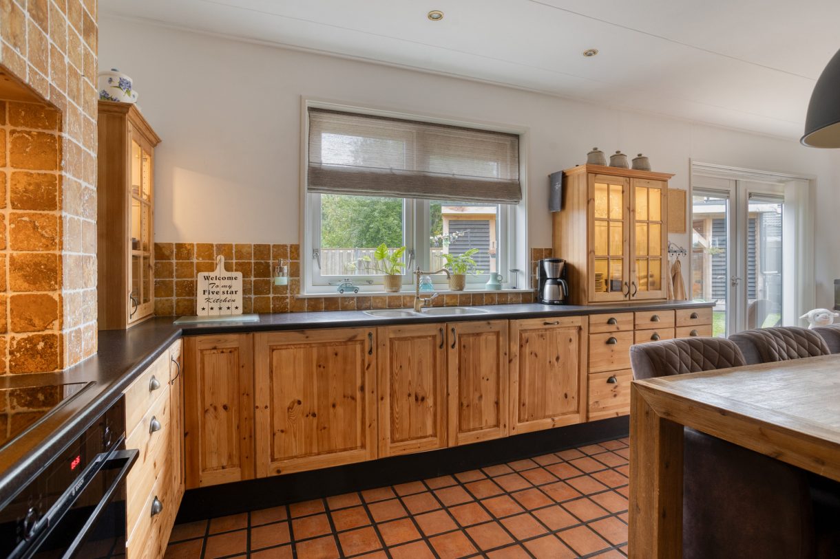 Te koop: Foto Woonhuis aan de Goudsbloemstraat 10 in Munnekezijl