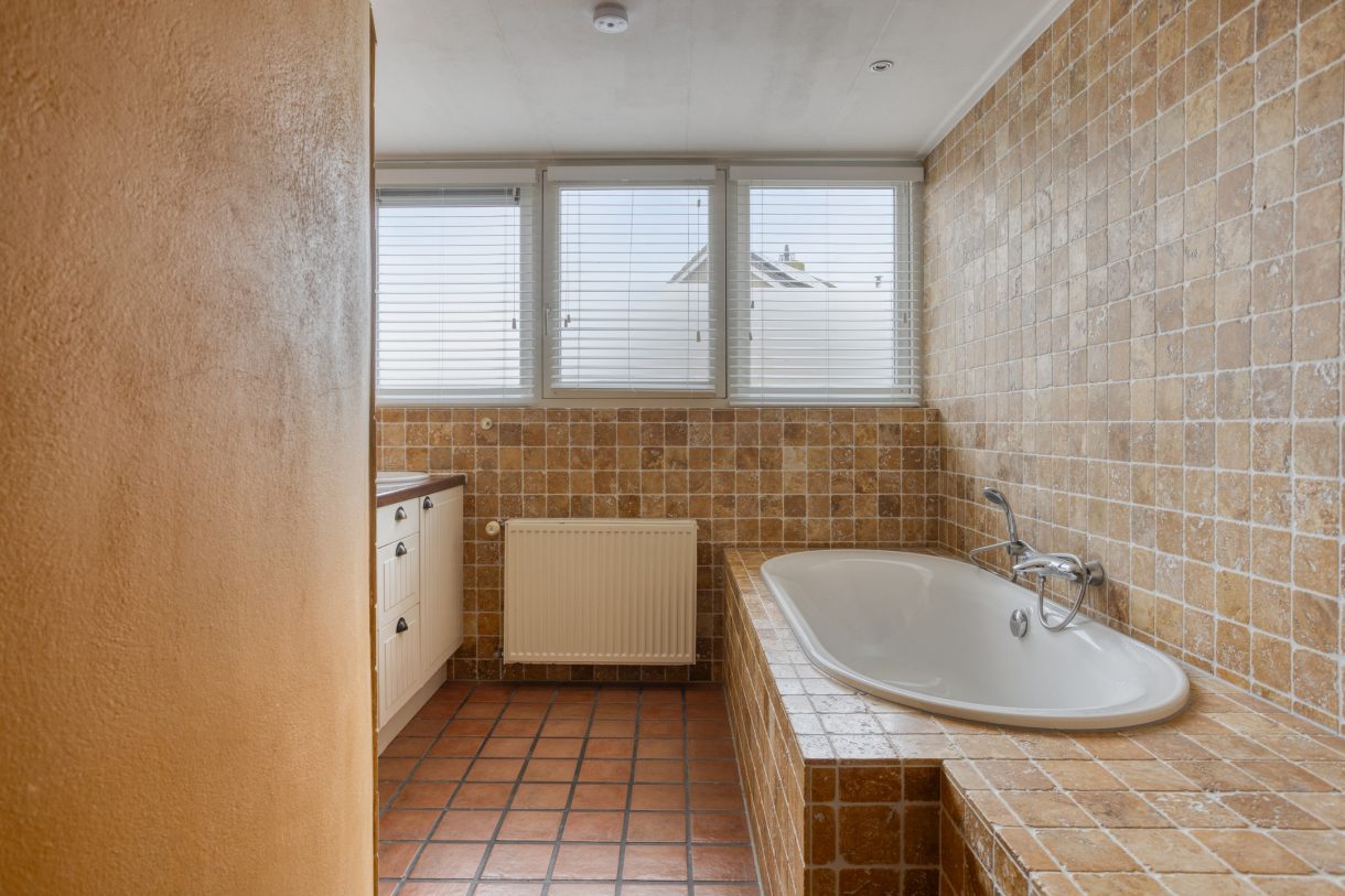 Te koop: Foto Woonhuis aan de Goudsbloemstraat 10 in Munnekezijl