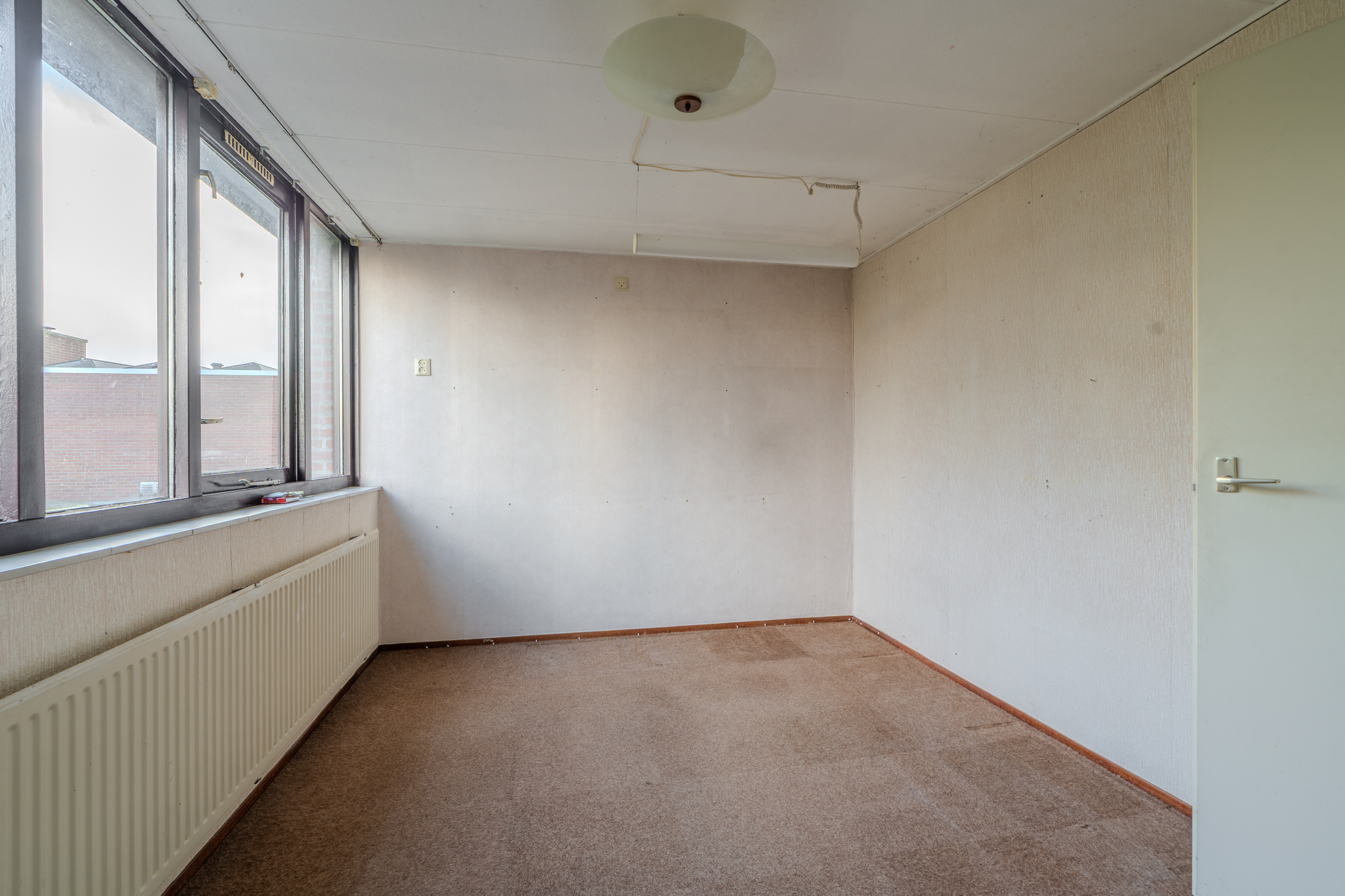 Te koop: Foto Woonhuis aan de Tiros 16 in Hoogezand