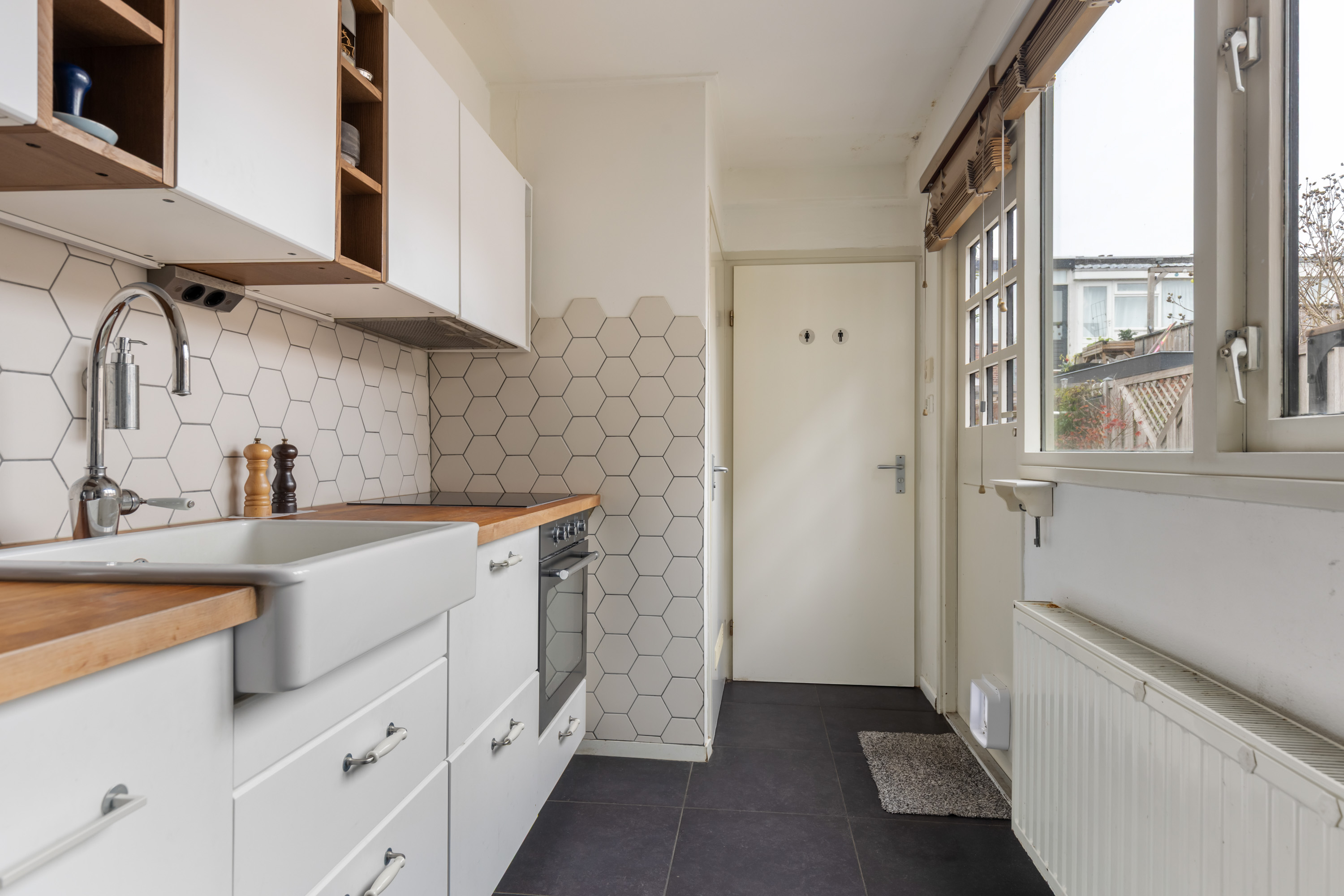 Te koop: Foto Woonhuis aan de Van Loonstraat 10 in Woerden