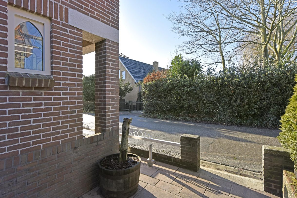 Te koop: Foto Woonhuis aan de Boddens Hosangweg 23 in Woubrugge