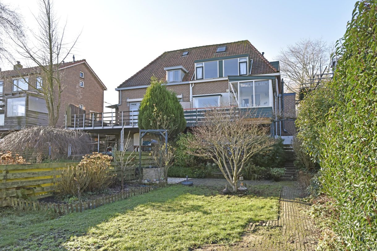 Te koop: Foto Woonhuis aan de Boddens Hosangweg 23 in Woubrugge