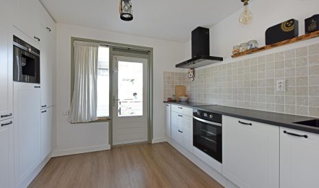 Te koop: Foto Woonhuis aan de Boddens Hosangweg 23 in Woubrugge