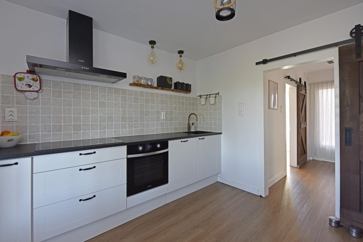 Te koop: Foto Woonhuis aan de Boddens Hosangweg 23 in Woubrugge