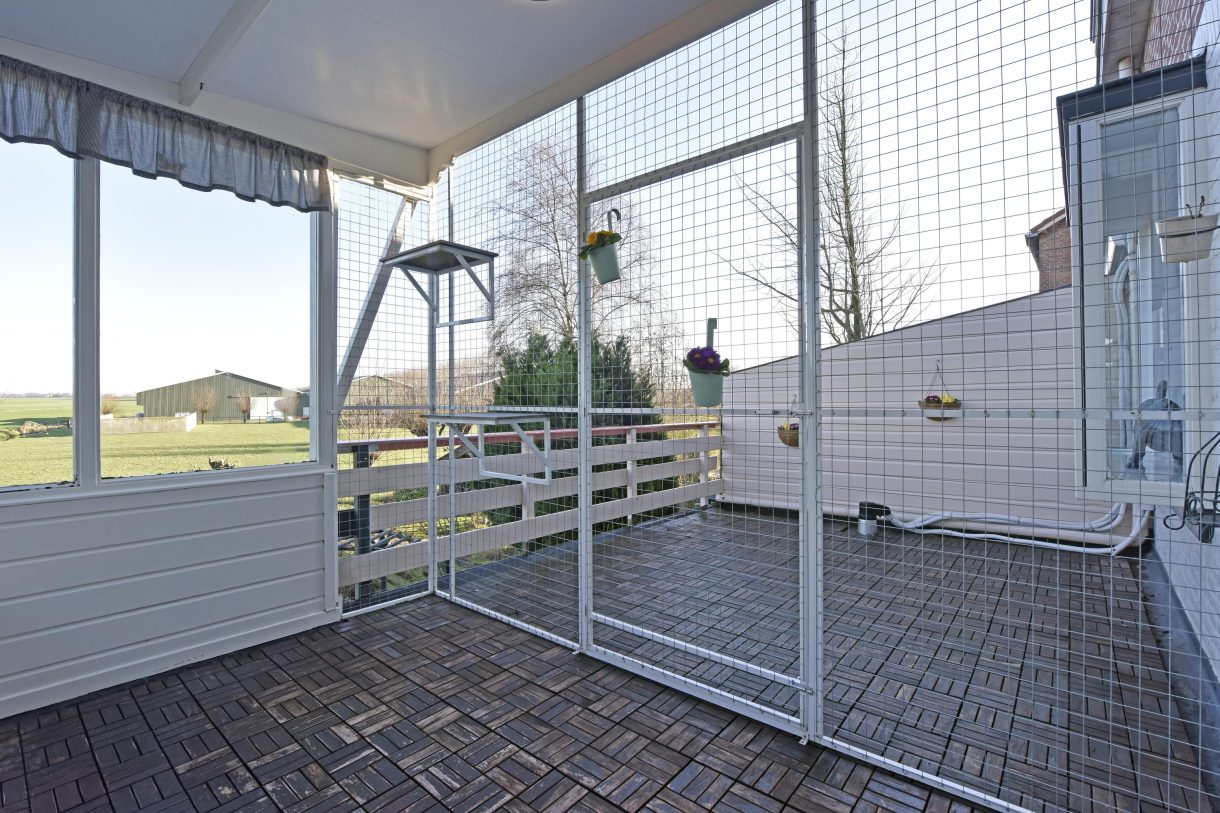 Te koop: Foto Woonhuis aan de Boddens Hosangweg 23 in Woubrugge