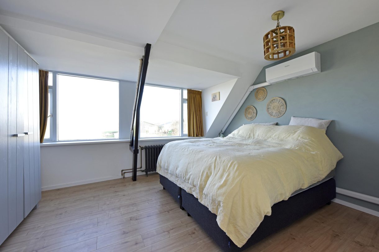 Te koop: Foto Woonhuis aan de Boddens Hosangweg 23 in Woubrugge