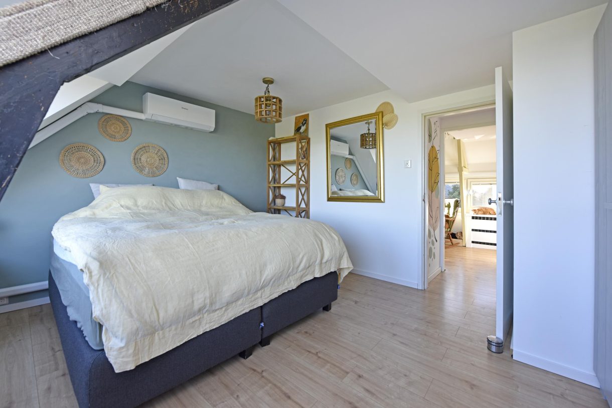 Te koop: Foto Woonhuis aan de Boddens Hosangweg 23 in Woubrugge