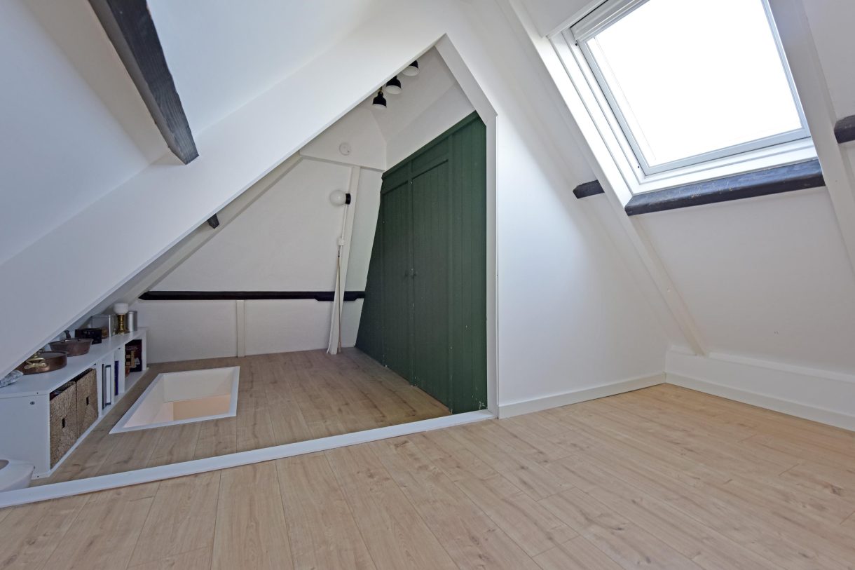 Te koop: Foto Woonhuis aan de Boddens Hosangweg 23 in Woubrugge