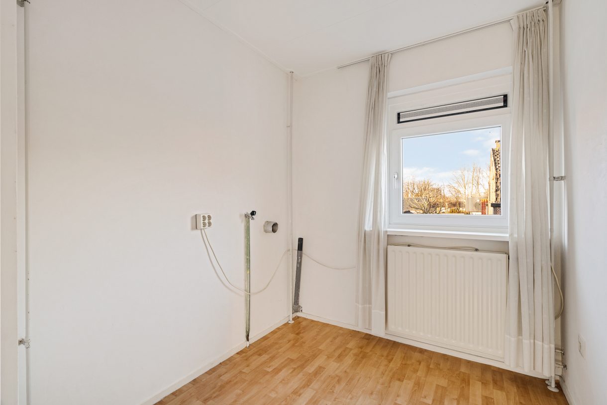 Te koop: Foto Woonhuis aan de Heistraat 27 in Rijen